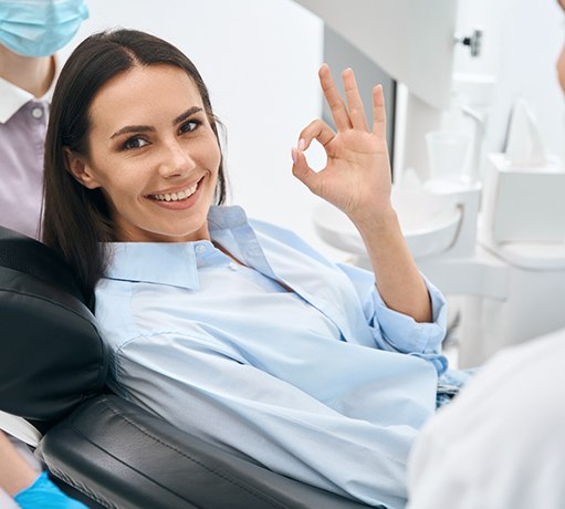 Smiling woman in the dental chair