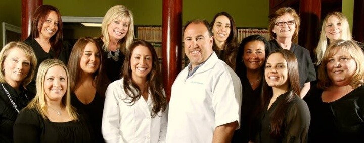 The smiling dentists and team at Medford Dental Arts
